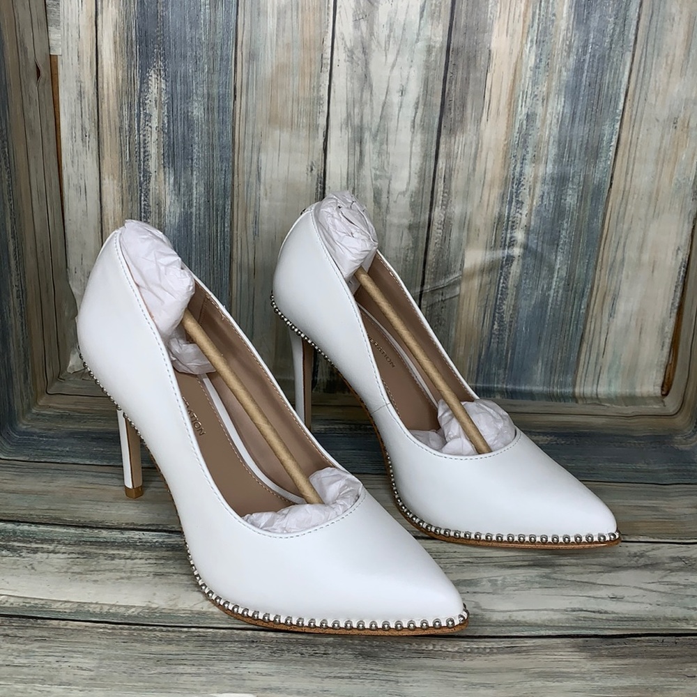 Holli Pointed Toe Pump
BCBG ENERATION white studs women heels ✅